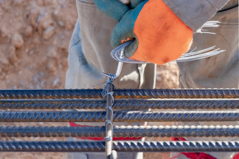 worker-uses-steel-tying-wire-fasten-steel-rods-reinforcement-bars-closeup-reinforced-concrete-structures-knitting-metal-reinforcing-cage (1)